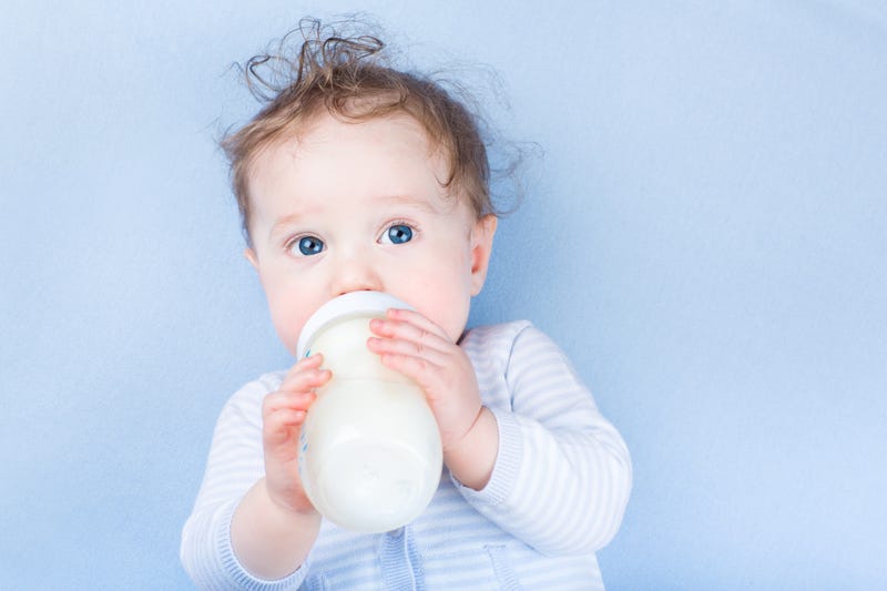 baby drinking a bottle