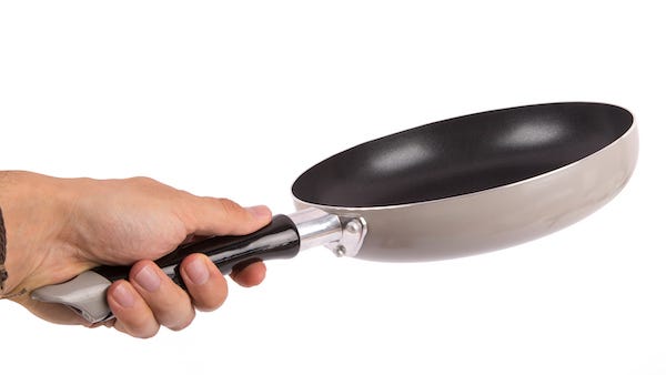 Man beats friend with a frying pan after he declined eating his fried potatoes