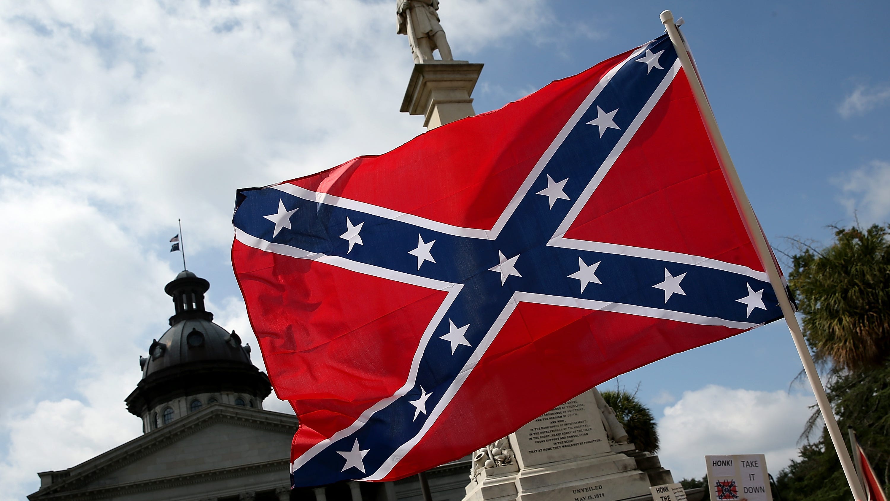 Photos show homemade police car at Minnesota county fair flying Confederate flag