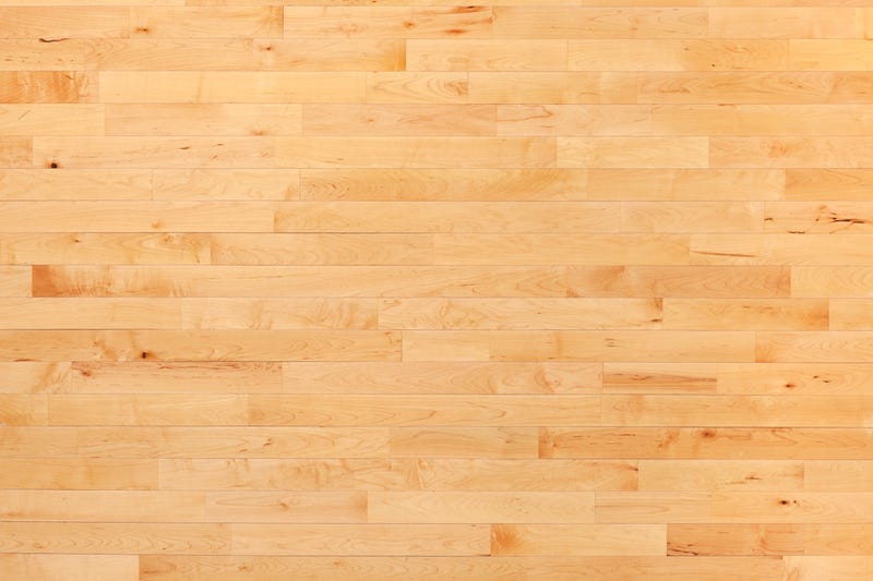 Hardwood maple basketball court floor viewed from above