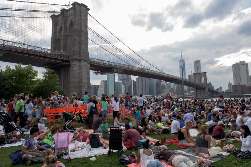 File photo: People gather to watch the Macy's Fourth of July Fireworks from Brooklyn Bridge Park, in Brooklyn, New York