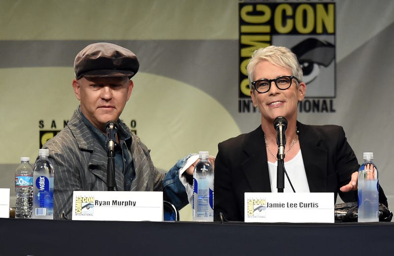 Executive producer/writer Ryan Murphy (L) and actress Jamie Lee Curtis speak onstage at the "American Horror Story" and "Scream Queens" panel during Comic-Con International 2015 at the San Diego Convention Center on July 12, 2015 in San Diego, California.