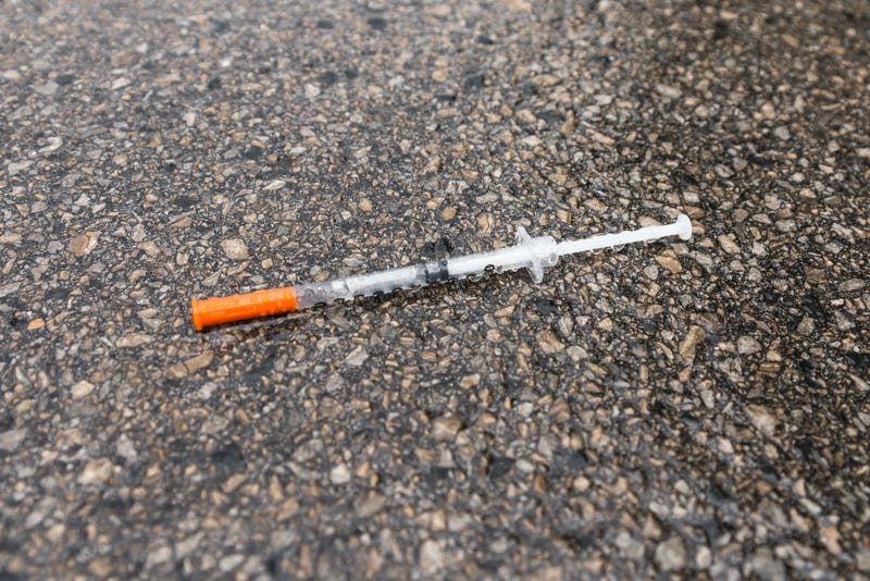a used syringe on the street