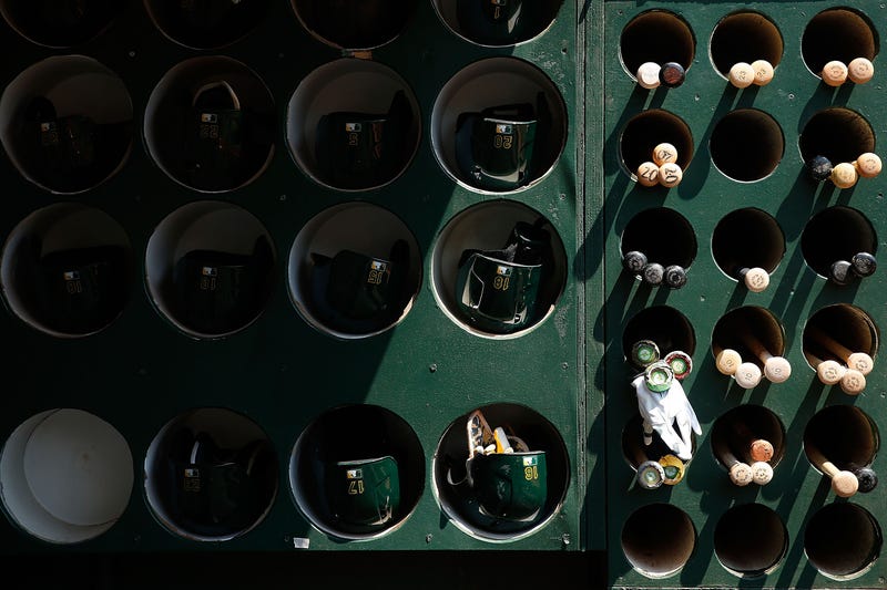 Baseball helmets and bats