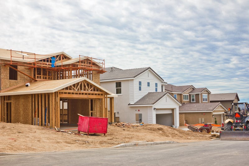 File photo of track homes completed and incomplete on a construction site.
