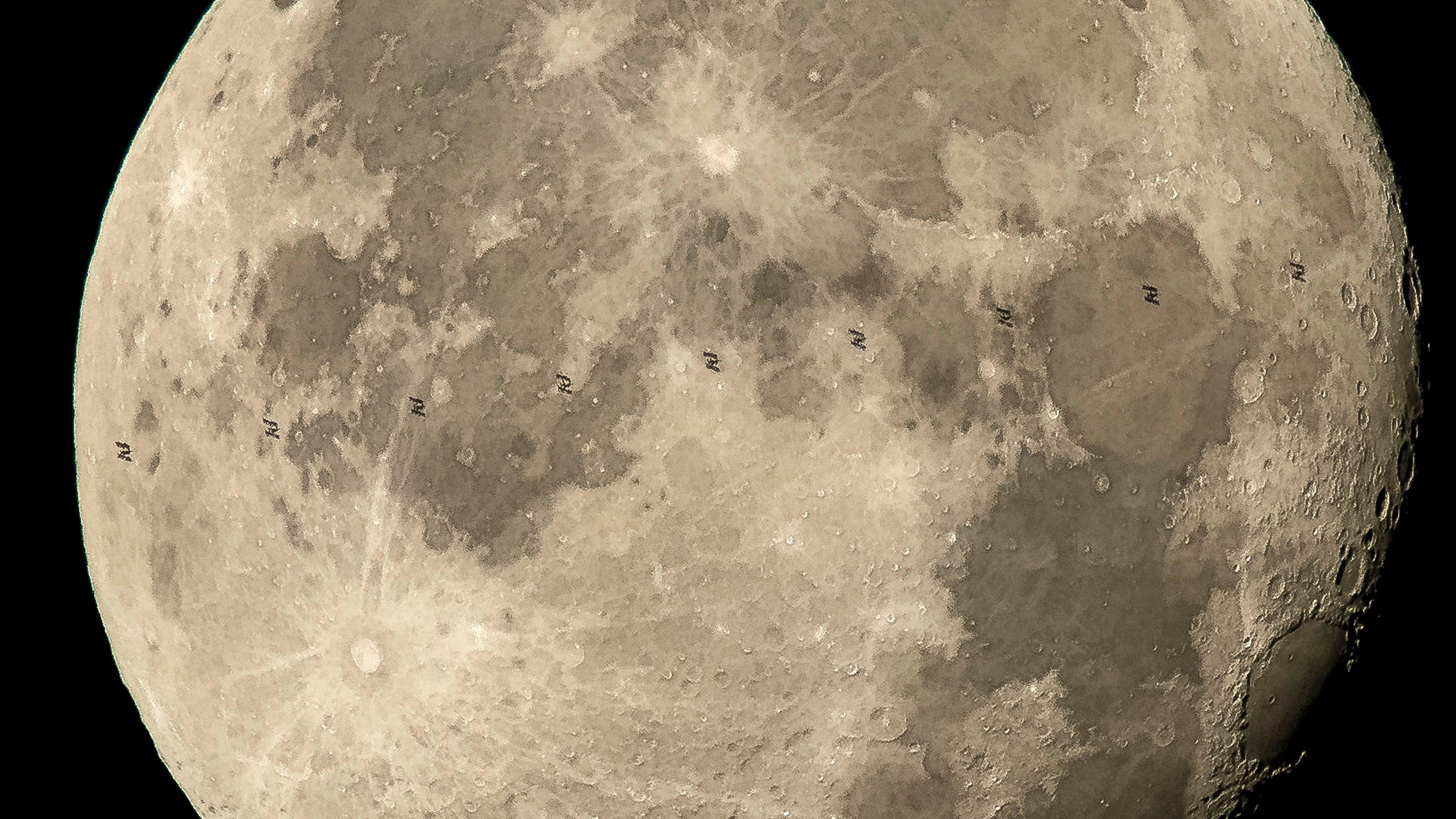 Orion captures photos of the dark side of the moon as it nears furthest distance from Earth