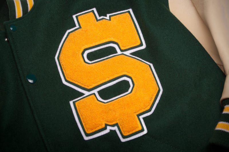 A dollar sign on a high school letter jacket.