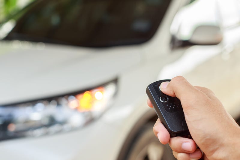 Person locking their car