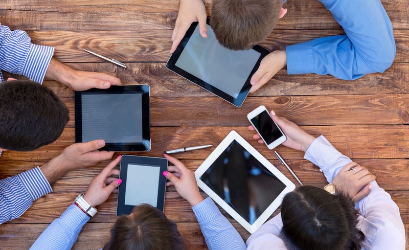 People sharing on different devices