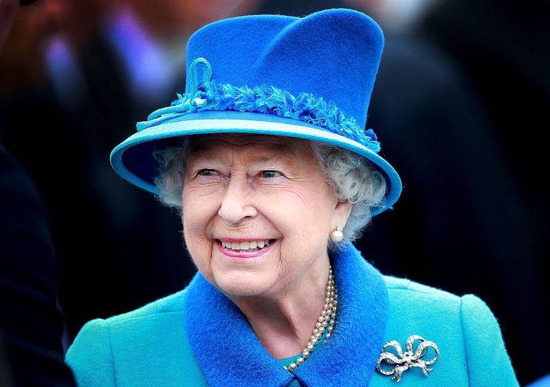 Queen Elizabeth II smiles as she arrives at Tweedbank Station on September 9, 2015 in Tweedbank, Scotland. 