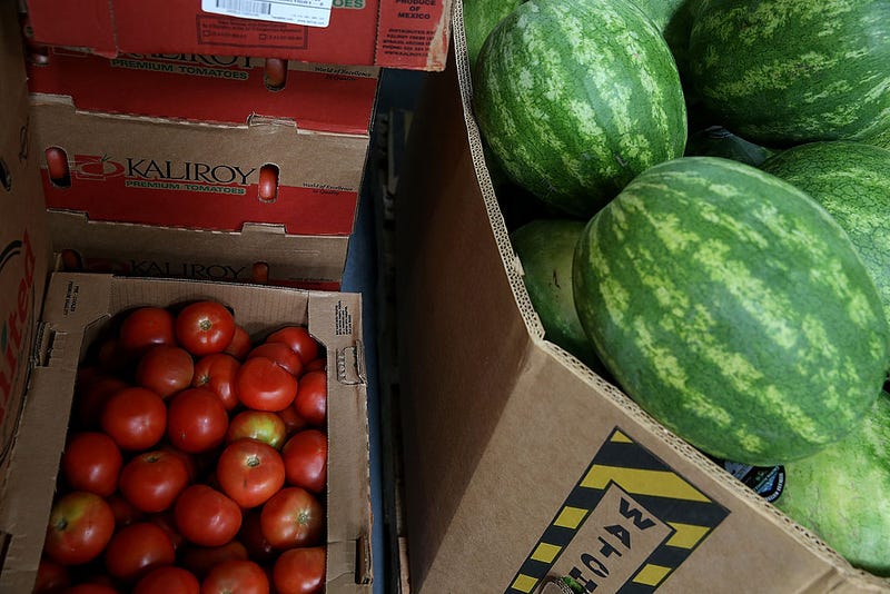 Boxes of tomatoes and watermelons sit in the warehouse at the SF-Marin Food Bank on May 1, 2014 in San Francisco, California.