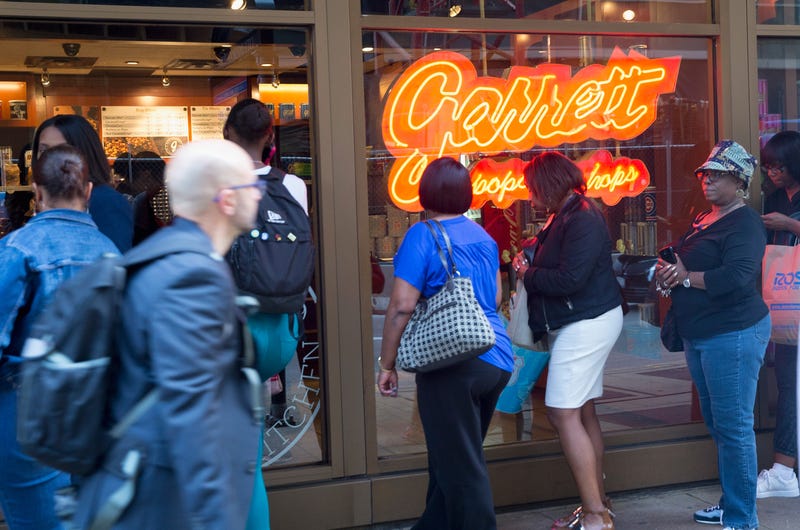 Patrons wait in line to buy Garrett's popcorn at a downtown store on September 15, 2015 in Chicago, Illinois.