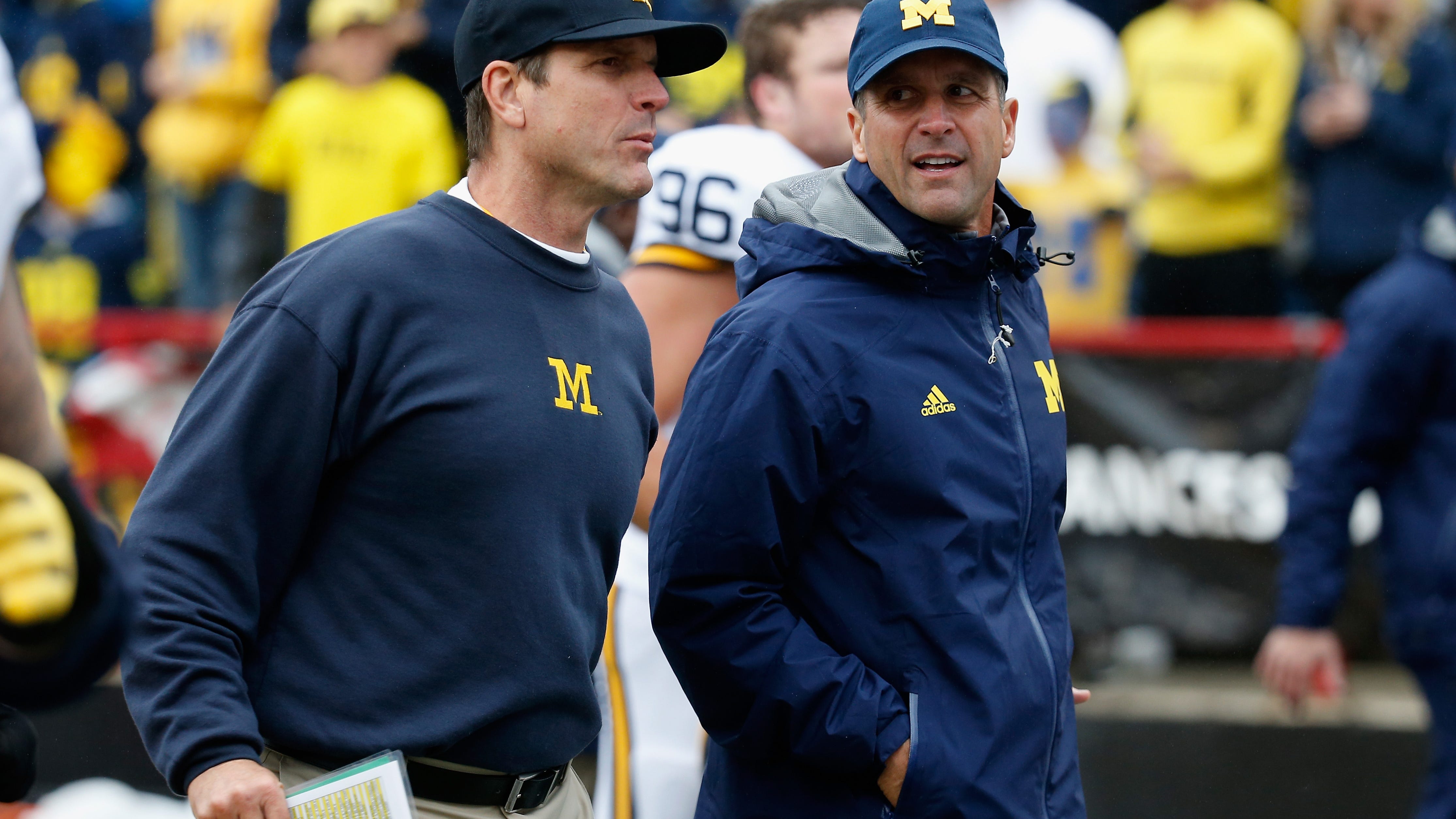 Harbaugh expected to hire coach from brother's staff to run Michigan defense
