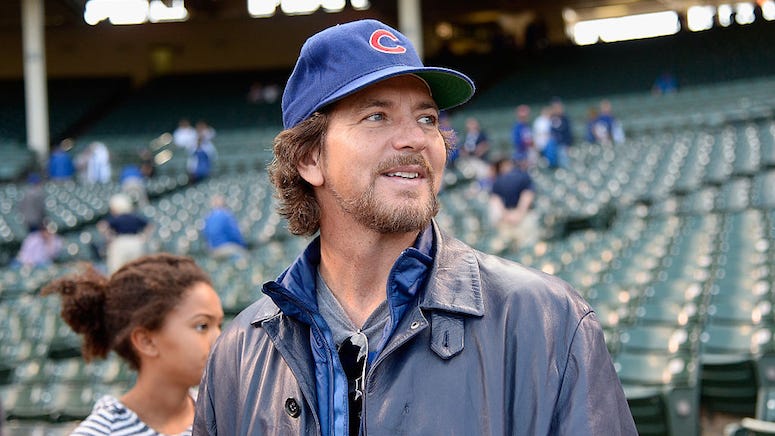 Watch Eddie Vedder Masterfully Hit a Baseball While Surfing