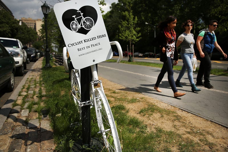 A "Ghost Bike", which are used to signify a fatality involving a bicycle, is viewed along a busy street on May 30, 2014 in the Brooklyn borough of New York City.