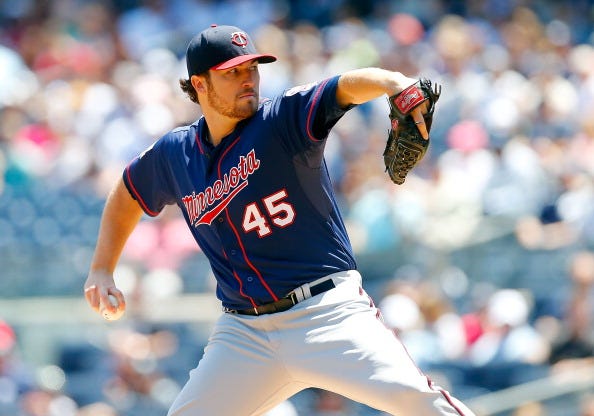 Phil Hughes #45 of the Minnesota Twins pitches in the first inning against the New York Yankees at Yankee Stadium on June 1, 2014 in the Bronx borough of New York City. 