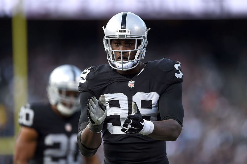 Outside linebacker Aldon Smith #99 of the Oakland Raiders celebrates in the third quarter against the Minnesota Vikings at O.co Coliseum on November 15, 2015 in Oakland, California.