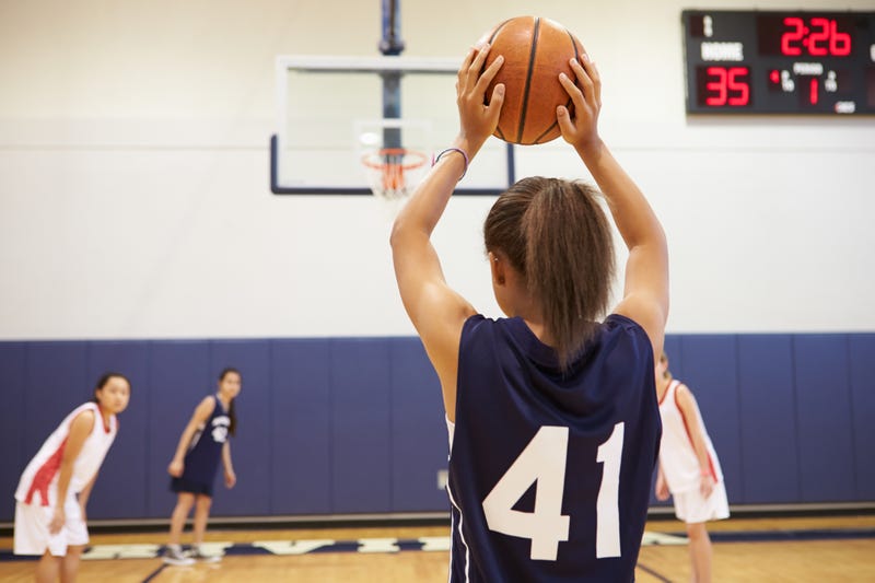 Girls playing basketball