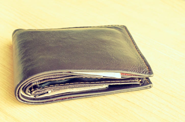Michigan autoworker's wallet found underneath hood of car in Minnesota 11 years after he lost it