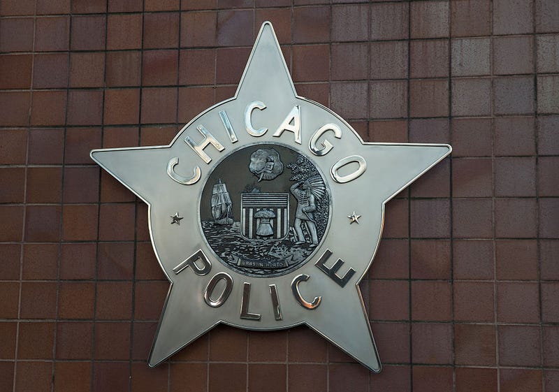 A Chicago police badge hangs in front of the City of Chicago Public Safety Headquarters on December 1, 2015 in Chicago, Illinois. 