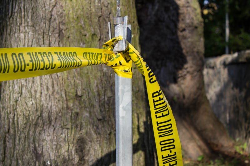 Crime Scene Tape tied to railing