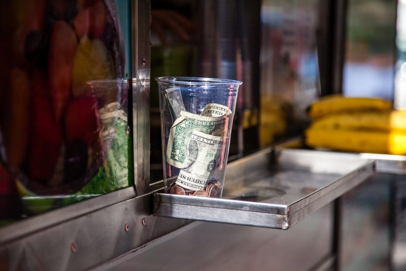 A tip jar in the sun.