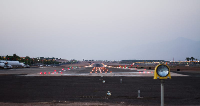 Airport runway at dusk. 