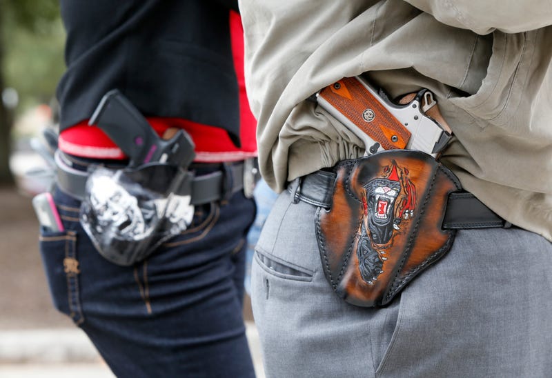 guns in holsters