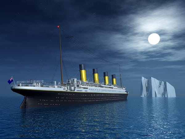 Computer generated 3D illustration of the Titanic and an iceberg