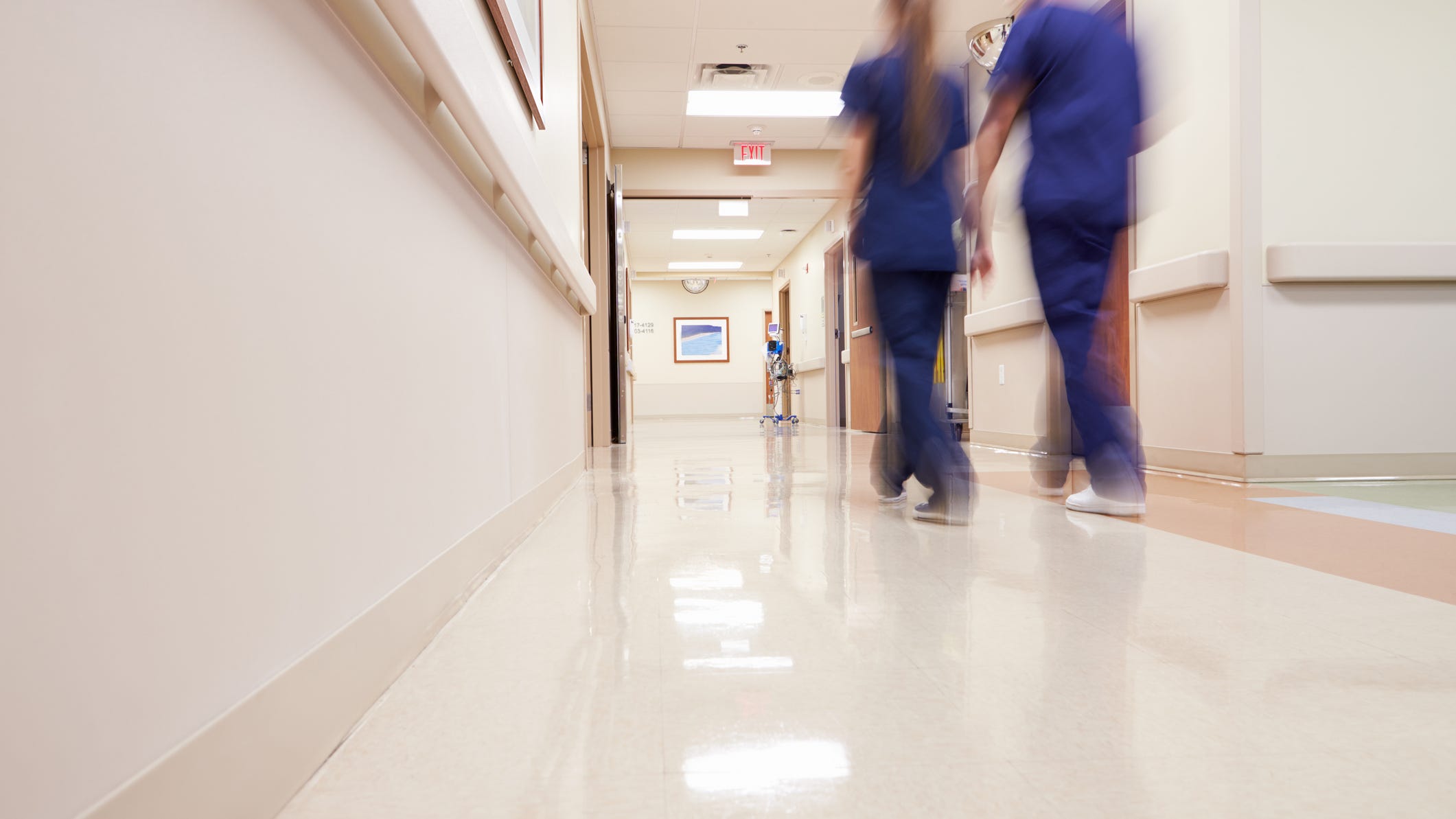 Who is filling up the COVID-19 wards at Michigan hospitals?