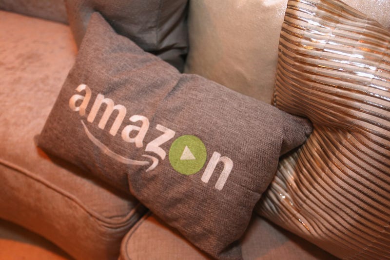 Pillows emblazoned with the Amazon logo 