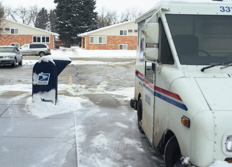 Ex-postal carriers among 11 charged in theft of credit cards