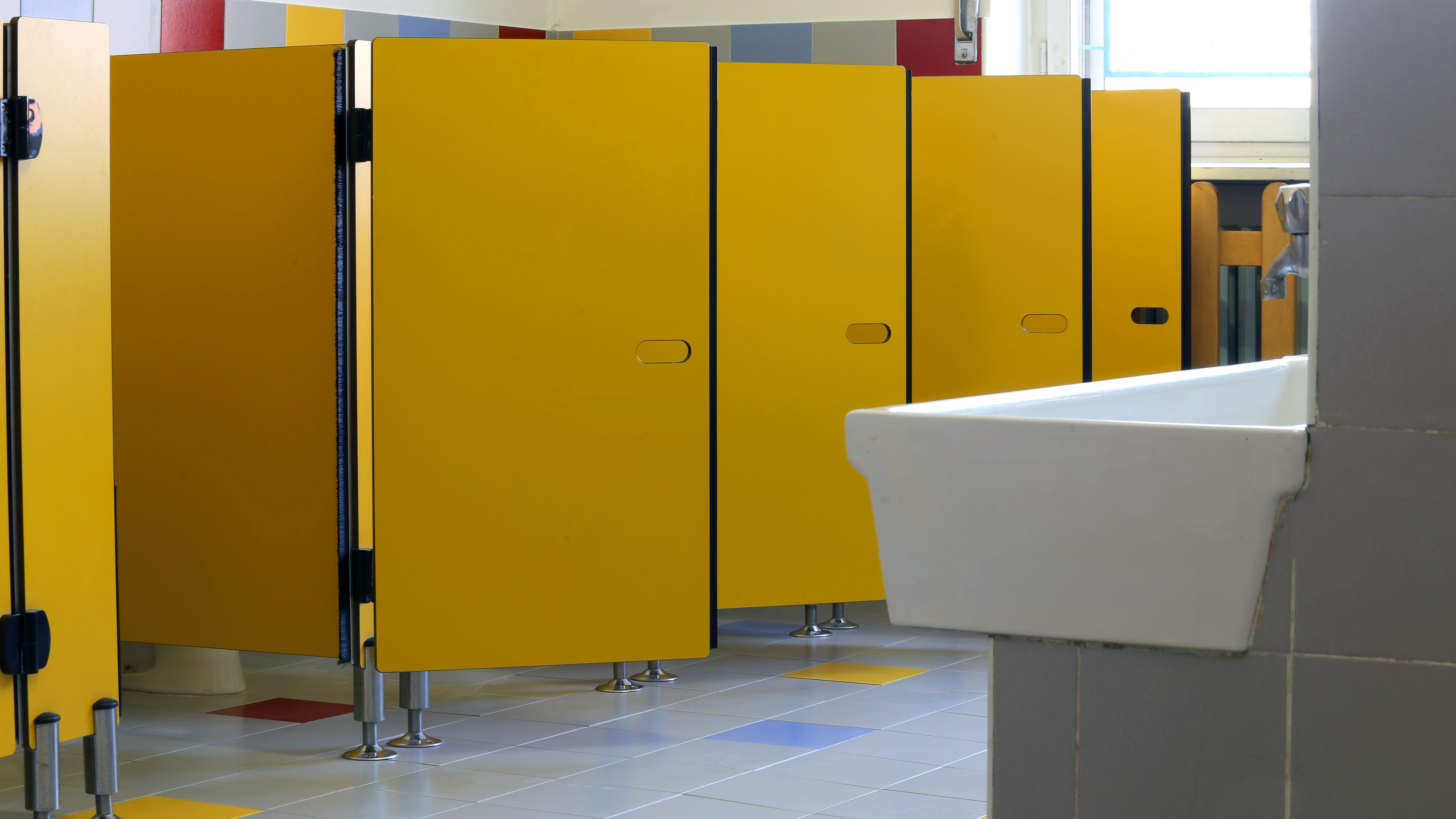 Teen facing charges, likely expulsion after writing shooting threat in bathroom at South Lyon East HS