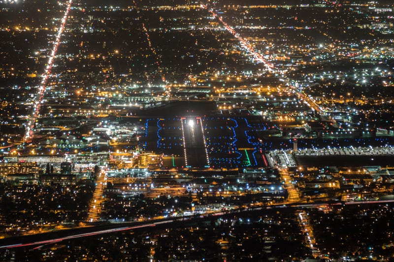 Night aerial of airport runway in Burbank, California.