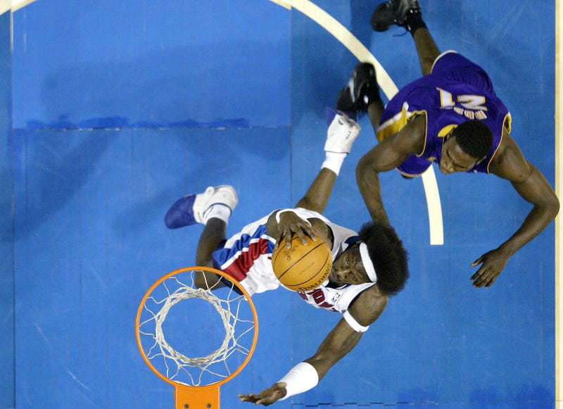 Former Detroit Pistons big Ben Wallace grabs a rebound during the 2004 NBA Finals.