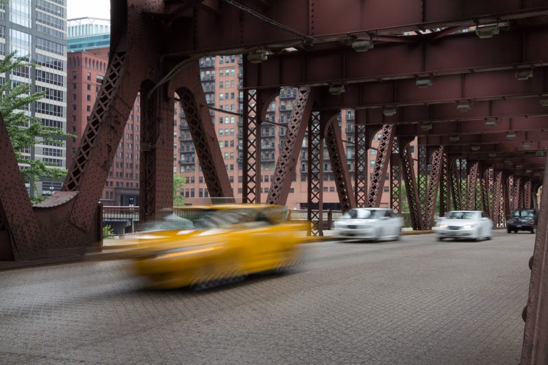 cars traveling on a Chicago bridge