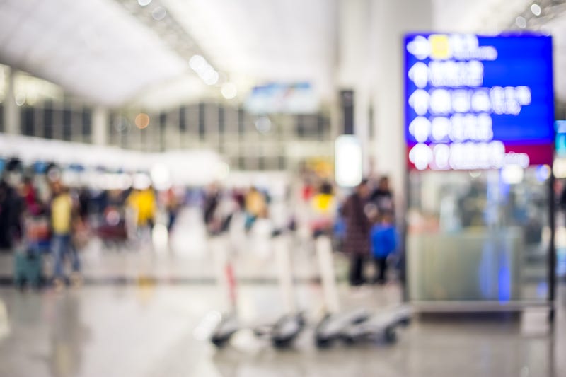 blurred image of lines at airport