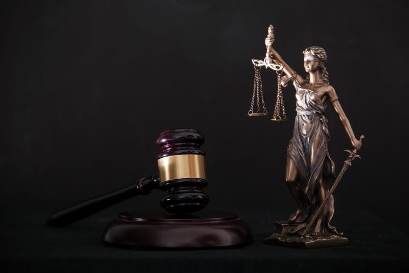 Justice statue and gavel stock photo. 