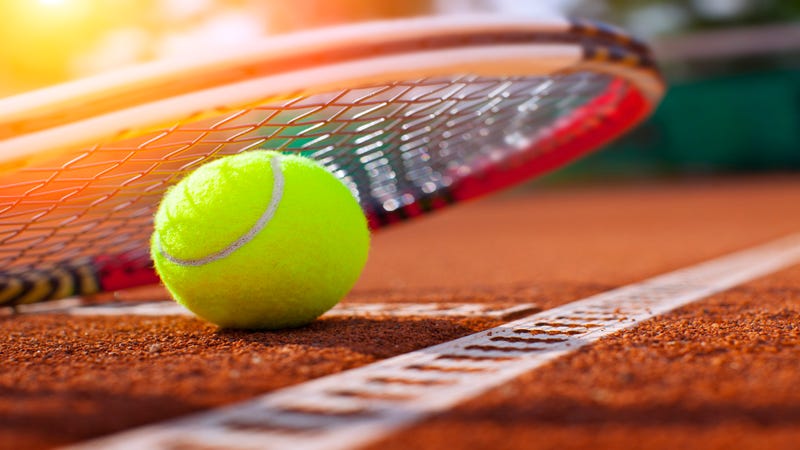 tennis ball on a tennis court - stock photo