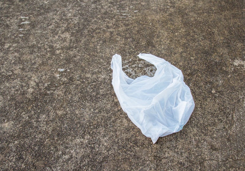 Gov. Kelly vetoes local bans on plastic bags, straws