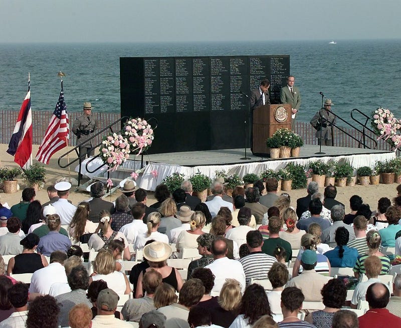 Hundreds of family members and friends gather for a one-year anniversary memorial service at Smith Point Park in New York on July 17, 1997. The Service was to remember those who died on TWA Flight 800. 