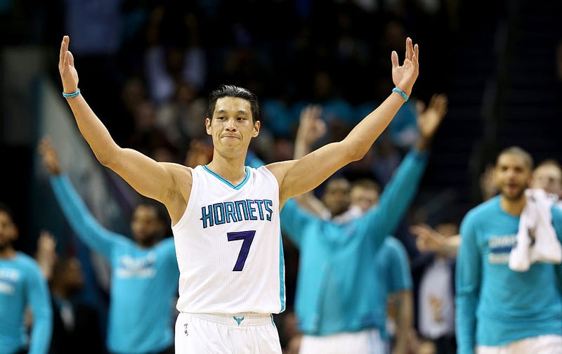 Jeremy Lin #7 of the Charlotte Hornets reacts after making a basket against the San Antonio Spurs during their game at Time Warner Cable Arena on March 21, 2016 in Charlotte, North Carolina.