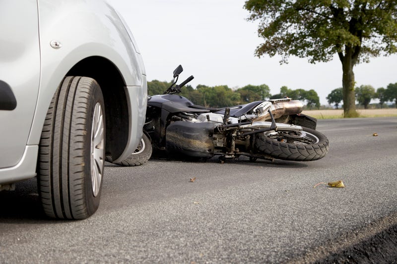 Motorcycle and car crash