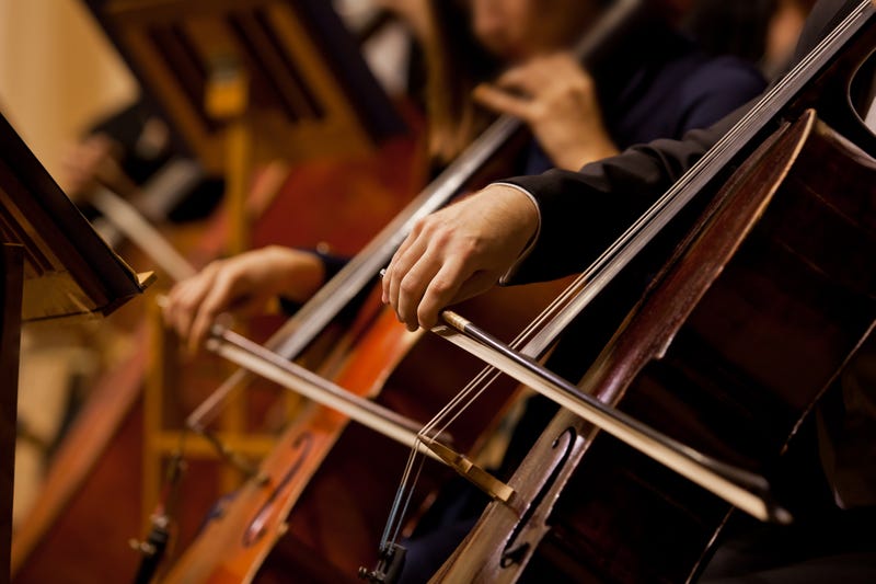 File photo of a man's hands playing the cello.