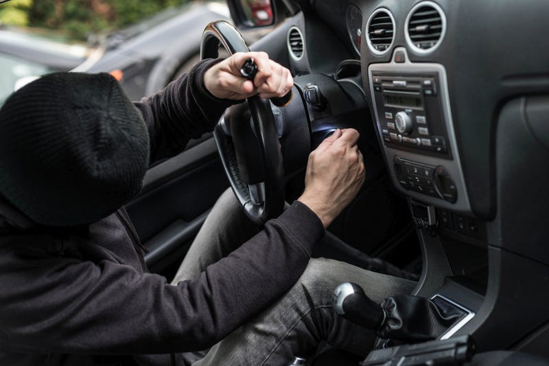 Thief stealing car