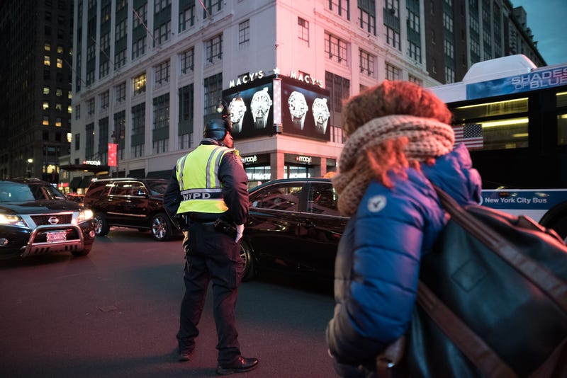 Heavy traffic near Macy's in Midtown Manhattan in December