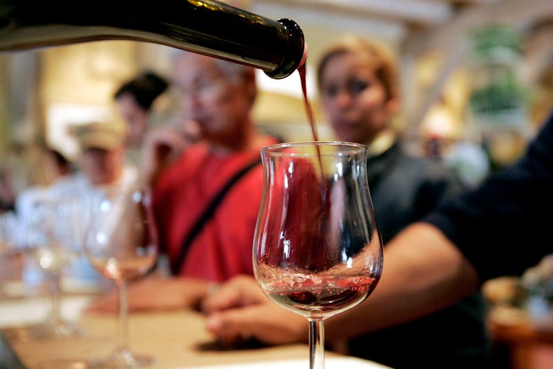People taste wine at the Vianasa Winery May 16, 2005 in Napa Valley, California. 