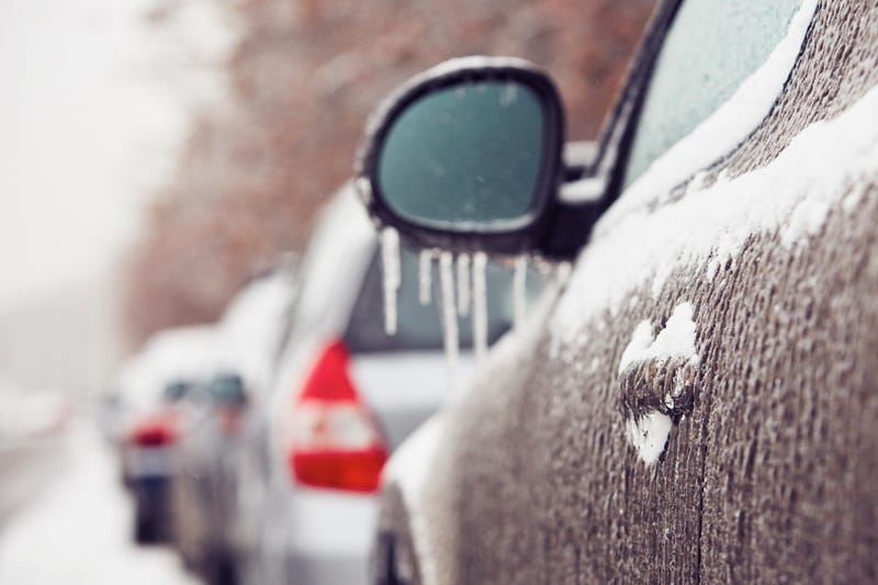 Ice accumulates on cars in this generic photo of winter weather driving