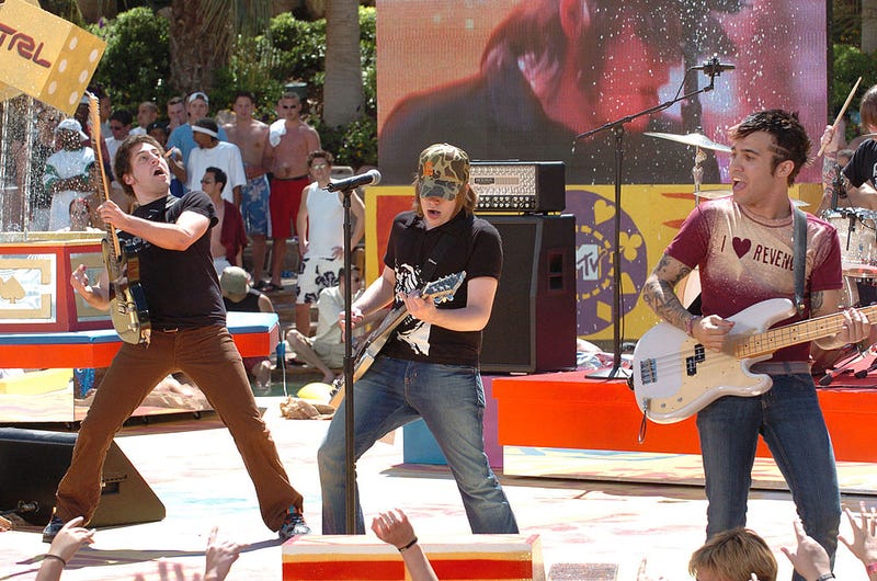 Joe Trohman, Patrick Stump and Pete Wentz of Fall Out Boy, during their performance at MTV TRL's Summer on the Strip at the Hard Rock Casino on June 3, 2005 in Las Vegas, Nevada
