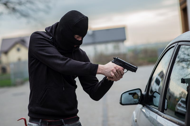 Auto theft with gun